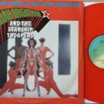 THE ADVENTURES OF THE LOVE CRUSADER - 12" RED VINYL